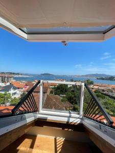 Casita Independiente y tres apartamentos con piscina Ladeira Playaにあるバルコニーまたはテラス