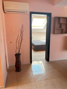 Ένα ή περισσότερα κρεβάτια σε δωμάτιο στο Apartament Samuela +3 φωτογραφίες