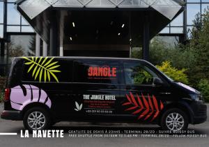 a black van with avertisement at The Jangle Hotel - Paris - Charles de Gaulle - Airport in Le Mesnil-Amelot +89 photos