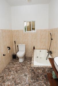 Ванна кімната в Suite Anzah meublee