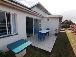 Κήπος έξω από το Chill-Ax Cottages