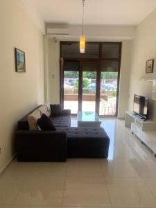 Et opholdsområde på Beach Apartment