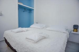 Un pat sau paturi într-o cameră la Apollo Retreat +22 fotografii