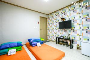 TV a/nebo společenská místnost v ubytování K Guesthouse