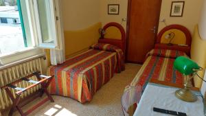 Posezení v ubytování Albergo Regina