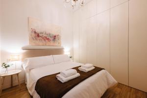 Postel nebo postele na pokoji v ubytování Espectacular Terraza Maravillas