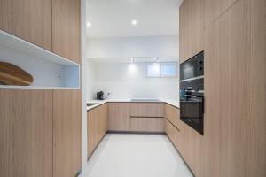 Η κουζίνα ή μικρή κουζίνα στο Amandine - Luxury 3 bedrooms apartment with free parking