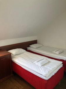 Postel nebo postele na pokoji v ubytování Gotthard Residents