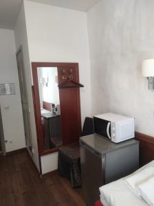 Postel nebo postele na pokoji v ubytování Gotthard Residents