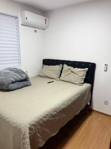 Postel nebo postele na pokoji v ubytování Quarto vip apto compartilhado