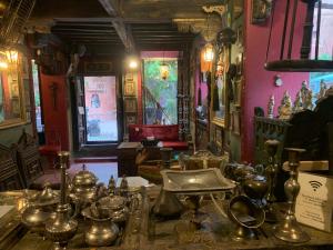 a room with a bunch of metal items on a table at Bhairon villas in Bikaner