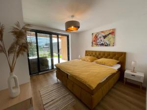 Photo de la galerie de l'établissement PENATI GOLF Apartment, à Šajdíkove Humence