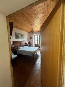 Postel nebo postele na pokoji v ubytování B&B COME UN TEMPO