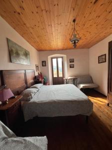 Postel nebo postele na pokoji v ubytování B&B COME UN TEMPO