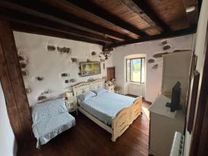 Postel nebo postele na pokoji v ubytování B&B COME UN TEMPO
