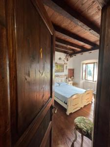 Postel nebo postele na pokoji v ubytování B&B COME UN TEMPO