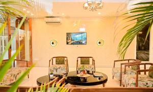 a room with a table and two chairs and a table at The Mohua - A Boutique Hotel in Rānchī