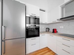 Kuchyň nebo kuchyňský kout v ubytování Alexandras Luxury Heaven + 33 fotografií