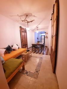 a living room with a couch and a table at Sun Seekers in Gualchos
