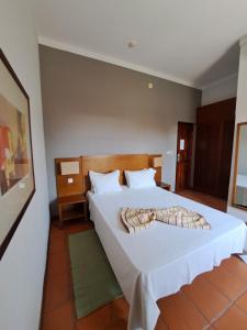 Postel nebo postele na pokoji v ubytování Bamboo Xaguate Hotel + 23 fotografií