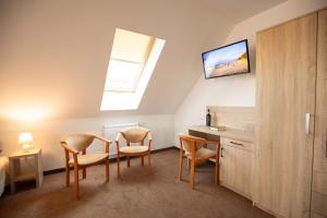 Телевизор и/или развлекательный центр в Soleil Resort & SPA