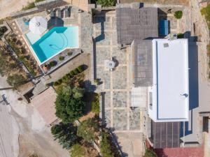 an overhead view of a building with a pool at Relax Joy Villa | Koundouros Kea Beachside in Koundouros
