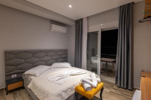 Postel nebo postele na pokoji v ubytování Sunkised Hotel