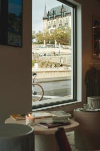 a window in a room with a view of a building at Hôtel de La Plage in Biarritz