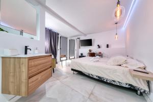 Ένα ή περισσότερα κρεβάτια σε δωμάτιο στο Macher Room