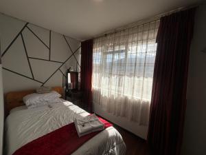 Postel nebo postele na pokoji v ubytování St. Gallen Haus
