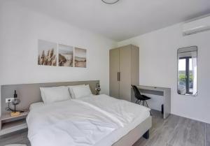 Ένα ή περισσότερα κρεβάτια σε δωμάτιο στο Villa Davide +11 φωτογραφίες