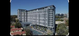 a rendering of a large building in a city at Capitol on the Park in Johannesburg