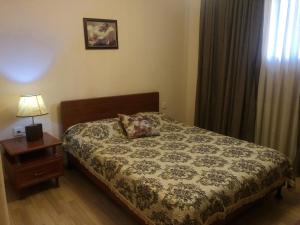 Postel nebo postele na pokoji v ubytování Piano Hotel