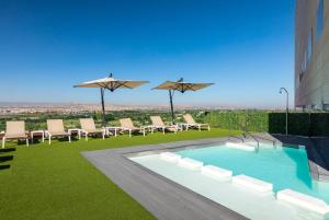 The swimming pool at or close to Barceló Granada Congress
