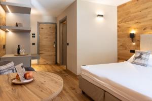 Postel nebo postele na pokoji v ubytování Hotel Relais Des Glaciers - Adults Only