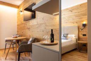 Postel nebo postele na pokoji v ubytování Hotel Relais Des Glaciers - Adults Only
