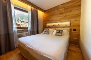 Postel nebo postele na pokoji v ubytování Hotel Relais Des Glaciers - Adults Only