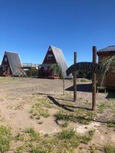 a sign for a playground in front of a house at Cabañas Hakuna Matata in San Blás