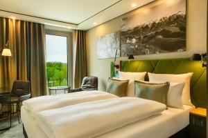 Posteľ alebo postele v izbe v ubytovaní Motel One Salzburg-Süd