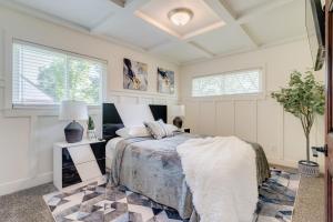 a bedroom with a bed and two windows at Luxury Midterm Rental for Families, Medical and Corporate Professionals Cincy in Cincinnati