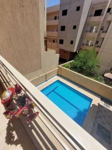 Bazén v ubytování Apartment in Hurghada nebo v jeho okolí
