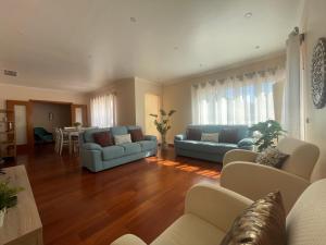 Khu vực ghế ngồi tại Caparica Villa - Sclusive Stay