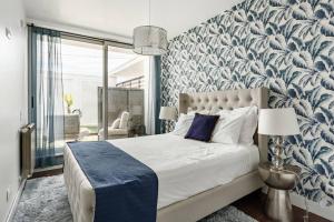 Ένα ή περισσότερα κρεβάτια σε δωμάτιο στο Casa do Pai Beach House +57 φωτογραφίες