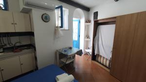 Kuchyň nebo kuchyňský kout v ubytování MiDé Capri House