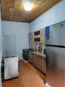 Kuchyň nebo kuchyňský kout v ubytování guest house udziro