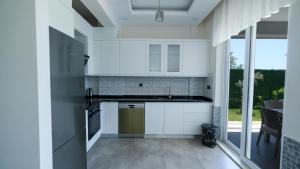 Dapur atau dapur kecil di Prestıge Villa