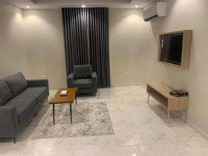 Televiisor ja/või meelelahutuskeskus majutusasutuses شقق هوليداي بلس مشرفه - Holiday Plus Mishrifah Apartments
