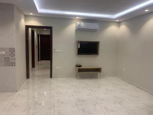 Televiisor ja/või meelelahutuskeskus majutusasutuses شقق هوليداي بلس مشرفه - Holiday Plus Mishrifah Apartments