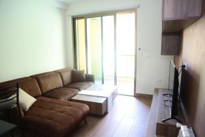 Телевізор і / або розважальний центр в Hilltop Faraya Suites