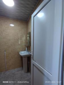 Vannituba majutusasutuses guest house udziro